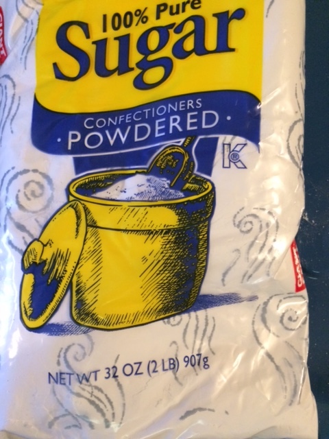 Two bags of 10-X powdered sugar are added to the base mix.