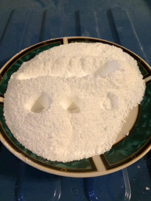 Consistency test of the powder. Note that it holds its shape better than the base powder.